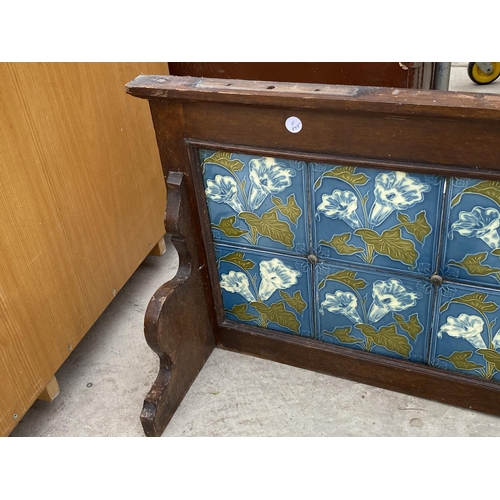 1428 - A VINTAGE DECORATIVE TILED BACK FROM A WASH STAND