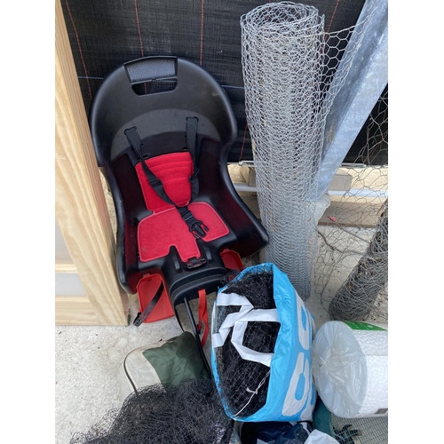 1555 - TWO ROLLS OF WIRE NETTING, A CHILD'S CAR SEAT, NETTING ETC