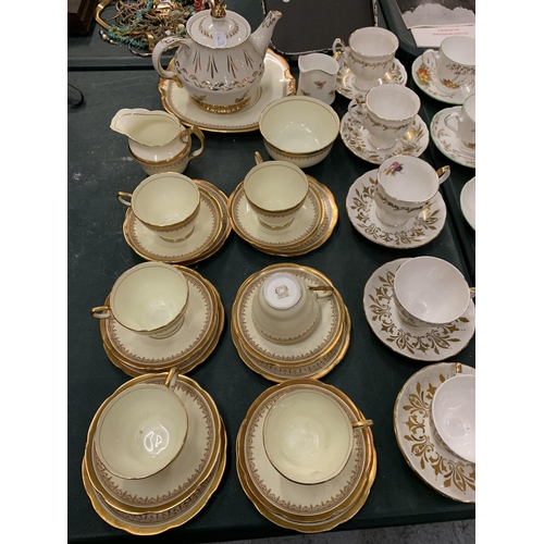 100 - A LARGE QUANTITY OF TEA WARE TO INCLUDE CROWN STAFFORDSHIRE, COLLINGWOODS ETC