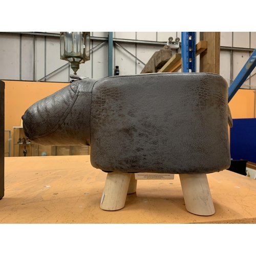 41 - A CHILD'S FAUX LEATHER FOOTSTOOL IN THE FORM OF A HIPPOPOTAMUS