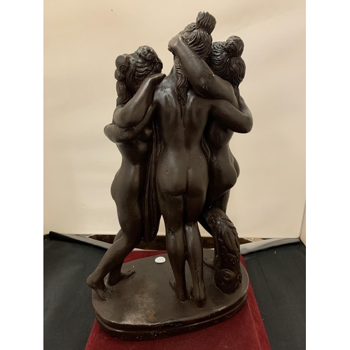 68 - AN ORNAMENT DEPICTING THE THREE MUSES - HEIGHT 43CMS