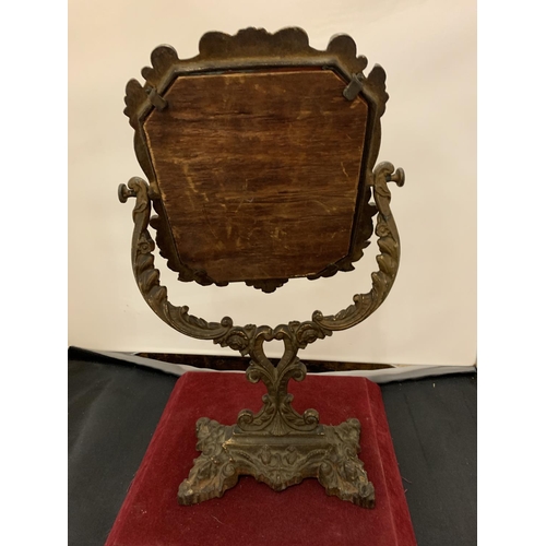 69 - AN ORNATE CAST IRON DRESSING TABLE SWIVEL MIRROR HEIGHT 40CM