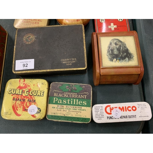 92 - AN ASSORTMENT OF VINTAGE METAL TINS TO INCLUDE A QUANTITY OF WATCH MOVEMENTS