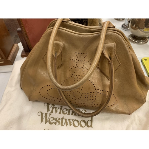 108 - A VINTAGE VIVIEN WESTWOOD GENUINE LEATHER HANDBAG TO INCLUDE A STORAGE BAG