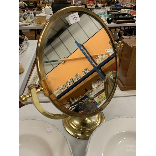 112 - A BRASS 19TH CENTURY STYLE SWING VANITY MIRROR ON PEDESTAL BASE