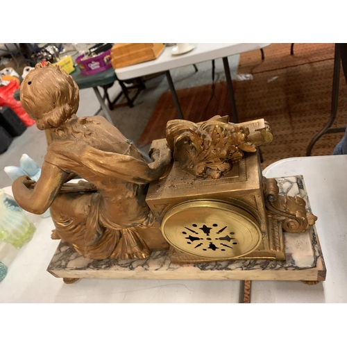 124 - A SPELTER FIGURINE MANTLE CLOCK ON MARBLE BASE