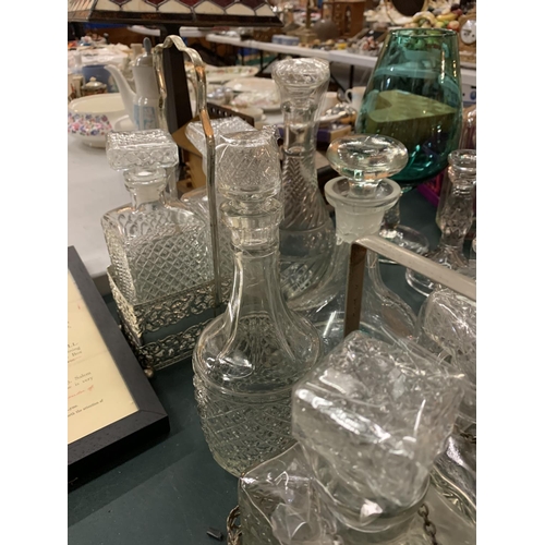 150 - A LARGE COLLECTION OF VARIOUS GLASS DECANTERS TO INCLUDE TWO STANDS AND TWO SPIRIT LABELS