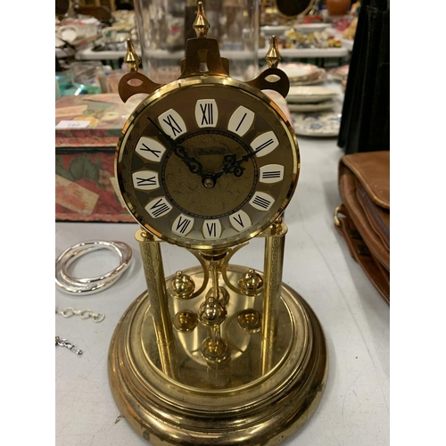 161 - A BRASS HALLER DOMED MANTLE CLOCK