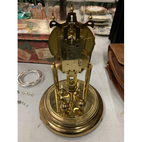 161 - A BRASS HALLER DOMED MANTLE CLOCK