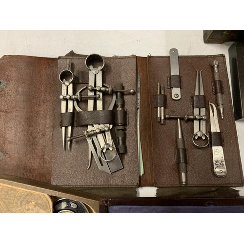 12 - A LARGE COLLECTION OF VINTAGE COMPASSES, TECHNICAL DRAWING INSTRUMENTS AND CALIPERS TO INCLUDING A M... 