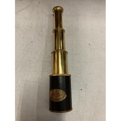 18 - A BOXED BRASS AND LEATHER MARINE TELESCOPE - 20CMS LONG WHEN EXTENDED