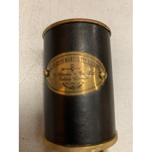 18 - A BOXED BRASS AND LEATHER MARINE TELESCOPE - 20CMS LONG WHEN EXTENDED