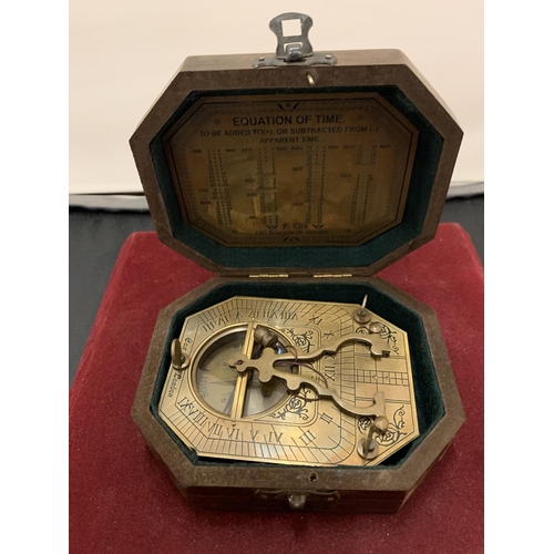 22 - A BOXED BRASS SUNDIAL COMPASS 'COX OF LONDON'