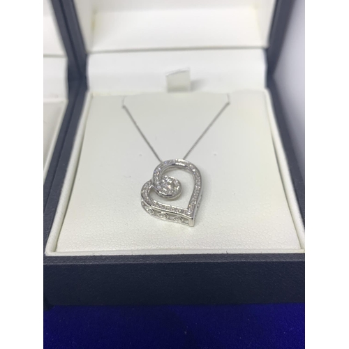 642 - FOUR BOXED SILVER ITEMS TO INCLUDE A HEART AND CLEAR STONE NECKLACE WITH EARRINGS, A CHAIN (A/F) WIT... 