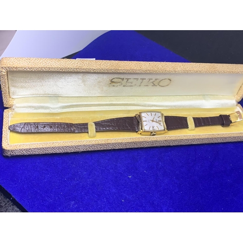 644 - TWO BOXED WATCHES TO INCLUDE A LADIES SEIKO WITH LEATHER STRAP IN WORKING ORDER AND A GENTS PHILIP M... 