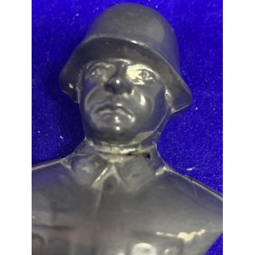 649 - A SMALL SPELTER FIGURE OF A GERMAN SOLDIER, 6.5CM (A/F)