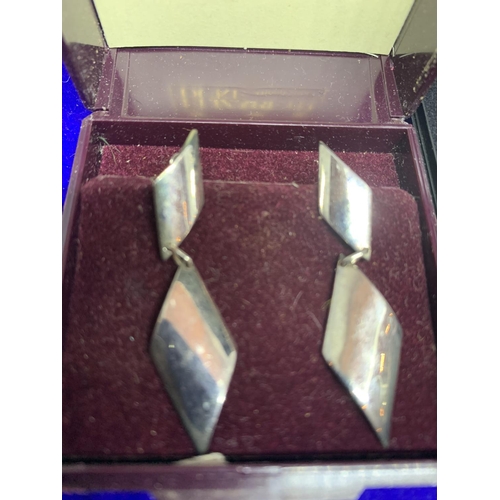 677 - THREE PAIRS OF SILVER EARRINGS MARKED 925 WITH PRESENTATION BOXES