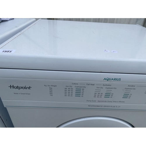 1803 - A WHITE HOTPOINT AQUARIUS TUMBLE DRYER BELIEVED IN WORKING ORDER BUT NO WARRANTY