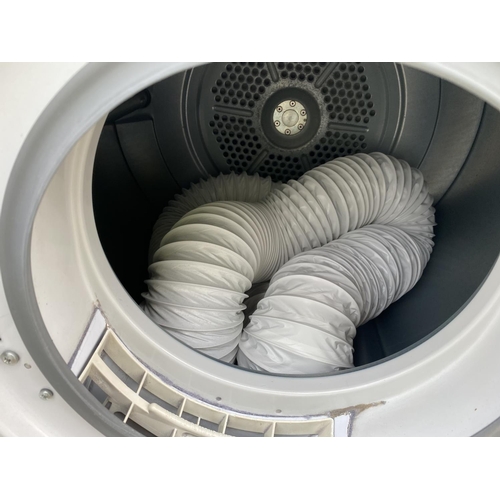 1803 - A WHITE HOTPOINT AQUARIUS TUMBLE DRYER BELIEVED IN WORKING ORDER BUT NO WARRANTY