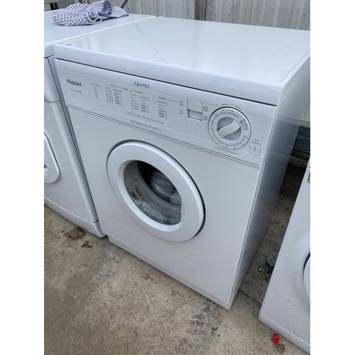 1803 - A WHITE HOTPOINT AQUARIUS TUMBLE DRYER BELIEVED IN WORKING ORDER BUT NO WARRANTY