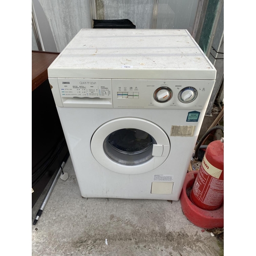 1811 - A WHITE ZANUSSI WASHING MACHINE BELIEVED IN WORKING ORDER BUT NO WARRANTY