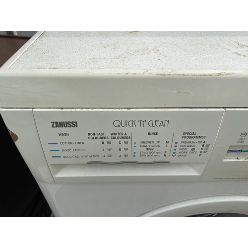 1811 - A WHITE ZANUSSI WASHING MACHINE BELIEVED IN WORKING ORDER BUT NO WARRANTY