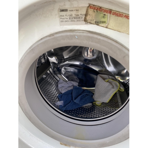 1811 - A WHITE ZANUSSI WASHING MACHINE BELIEVED IN WORKING ORDER BUT NO WARRANTY