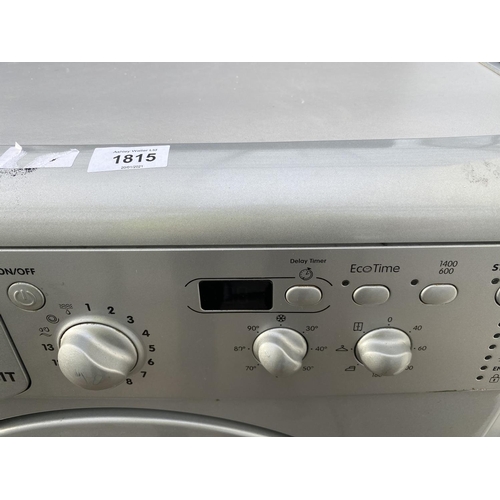 1815 - A SILVER INDESIT 7KG WASHING MACHINE BELIEVED IN WORKING ORDER BUT NO WARRANTY