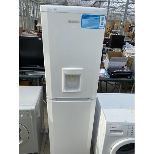 1816 - A WHITE BEKO UPRIGHT FRIDGE FREEZER WITH WATER DISPENSER BELIEVED IN WORKING ORDER BUT NO WARRANTY