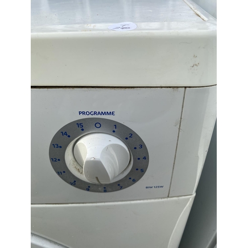 1819 - A WHITE BENDIX WASHING MACHINE BELIEVED IN WORKING ORDER BUT NO WARRANTY