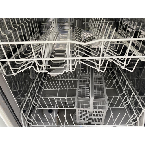 1820 - A WHITE BOSCH DISHWASHER BELIEVED IN WORKING ORDER BUT NO WARRANTY