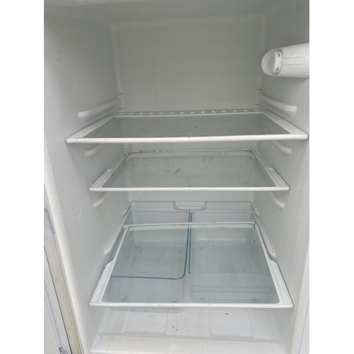 1821 - A WHITE BOSCH UPRIGHT FRIDGE FREEZER BELIEVED IN WORKING ORDER BUT NO WARRANTY