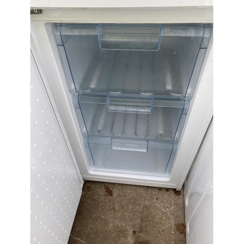 1821 - A WHITE BOSCH UPRIGHT FRIDGE FREEZER BELIEVED IN WORKING ORDER BUT NO WARRANTY