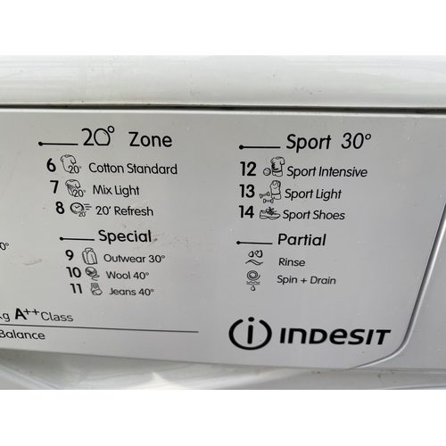 1822 - A WHITE INDESIT 7KG WASHING MACHINE BELIEVED IN WORKING ORDER BUT NO WARRANTY