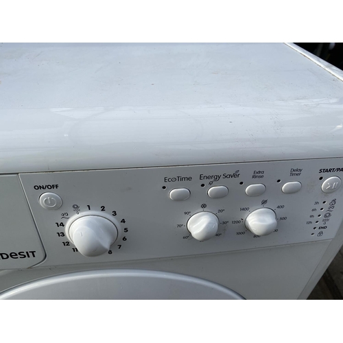 1822 - A WHITE INDESIT 7KG WASHING MACHINE BELIEVED IN WORKING ORDER BUT NO WARRANTY