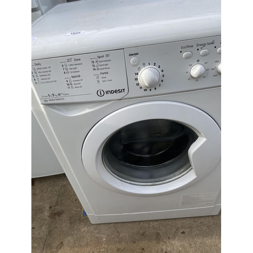 1822 - A WHITE INDESIT 7KG WASHING MACHINE BELIEVED IN WORKING ORDER BUT NO WARRANTY