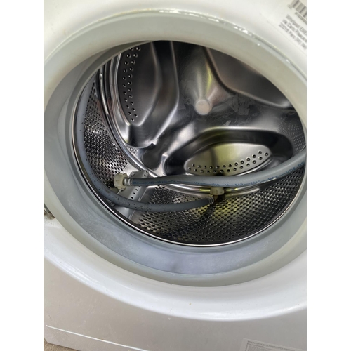 1822 - A WHITE INDESIT 7KG WASHING MACHINE BELIEVED IN WORKING ORDER BUT NO WARRANTY