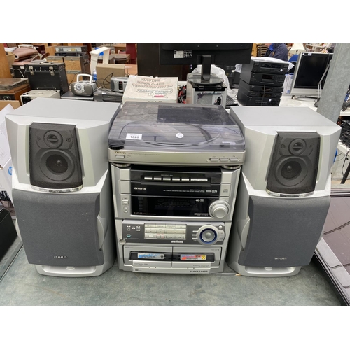 1828 - AN AIWA STEREO SYSTEM WITH TWO SPEAKERS IN W/O BUT NO WARRENTY