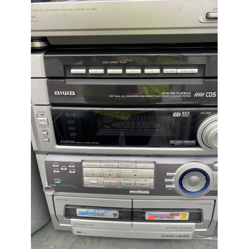 1828 - AN AIWA STEREO SYSTEM WITH TWO SPEAKERS IN W/O BUT NO WARRENTY