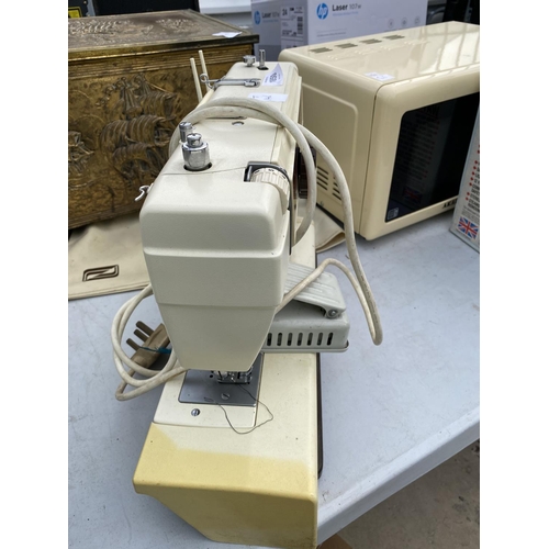 1850 - A NEW HOME SEWING MACHINE WITH COVER AND A FURTHER DECORATIVE BRASS BOX