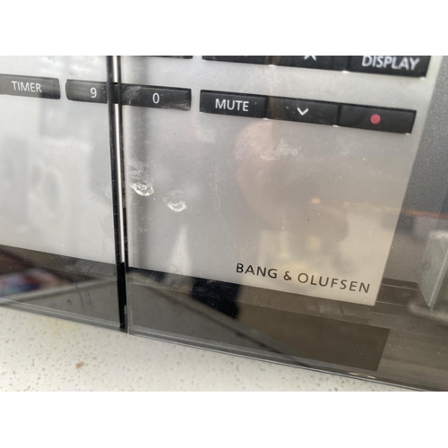 1858 - A BANG AND OULFSEN HI-FI SYSTEM BELIEVED IN WORKING ORDER BUT NO WARRANTY