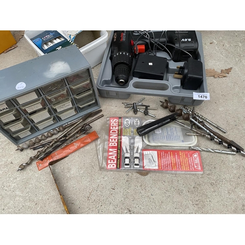 1470 - A POWER DEVIL BATTERY DRILL AND AN ASSORTMENT OF DRILL BITS