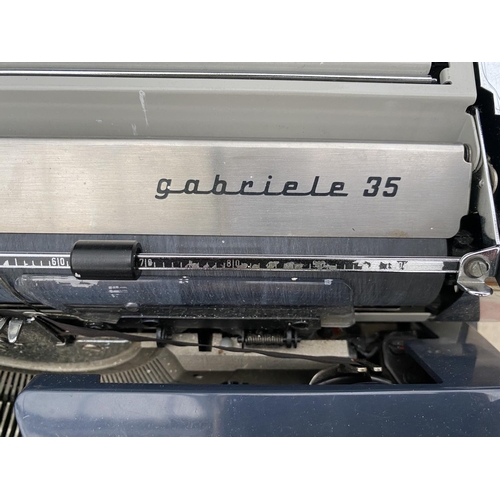 1483 - AN ADLER GABRIELE 35 TYPE WRITER IN A CASE