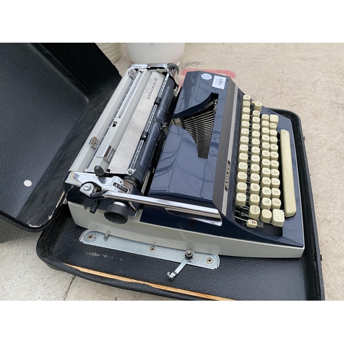 1483 - AN ADLER GABRIELE 35 TYPE WRITER IN A CASE