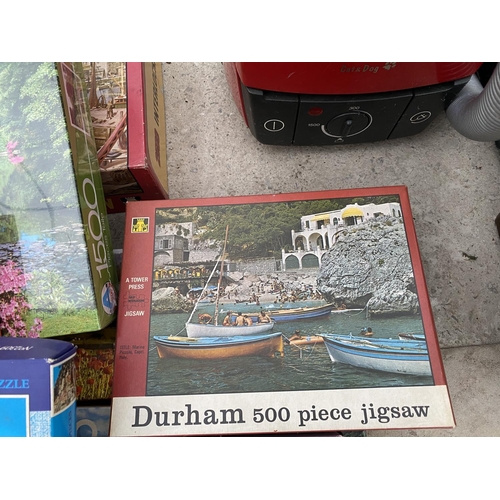 1487 - A LARGE COLLECTION OF JIGSAW PUZZLES