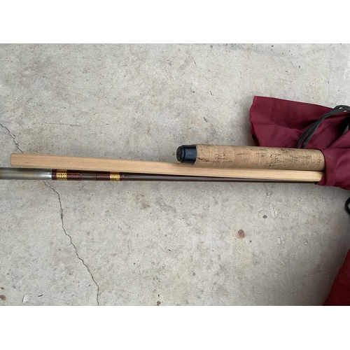 1507 - AN ABU CASTER DUETT ZOOM SPLIT CAN FISHING ROD