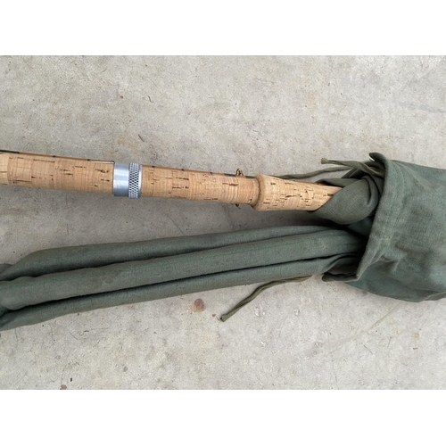 1508 - A FOUR SECTION SPLIT CANE FISHING ROD