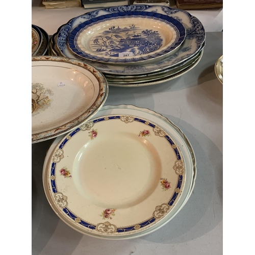 287 - A LARGE COLLECTION OF EARLY CERAMIC MEAT PLATTERS AND PLATES