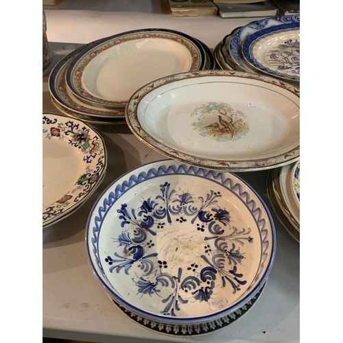 287 - A LARGE COLLECTION OF EARLY CERAMIC MEAT PLATTERS AND PLATES