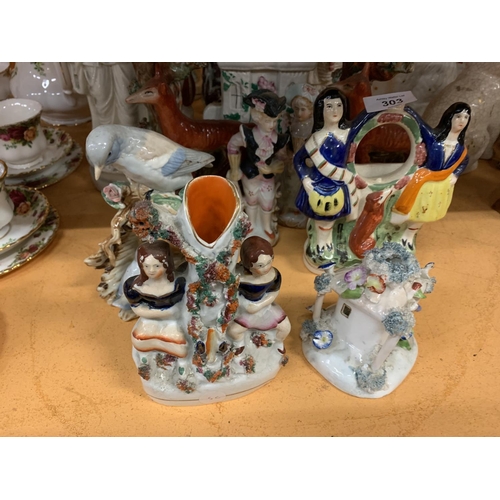 303 - A GROUP OF STAFFORDSHIRE FLATBACKS TO INCLUDE BOTH ANIMALS AND FIGURINES